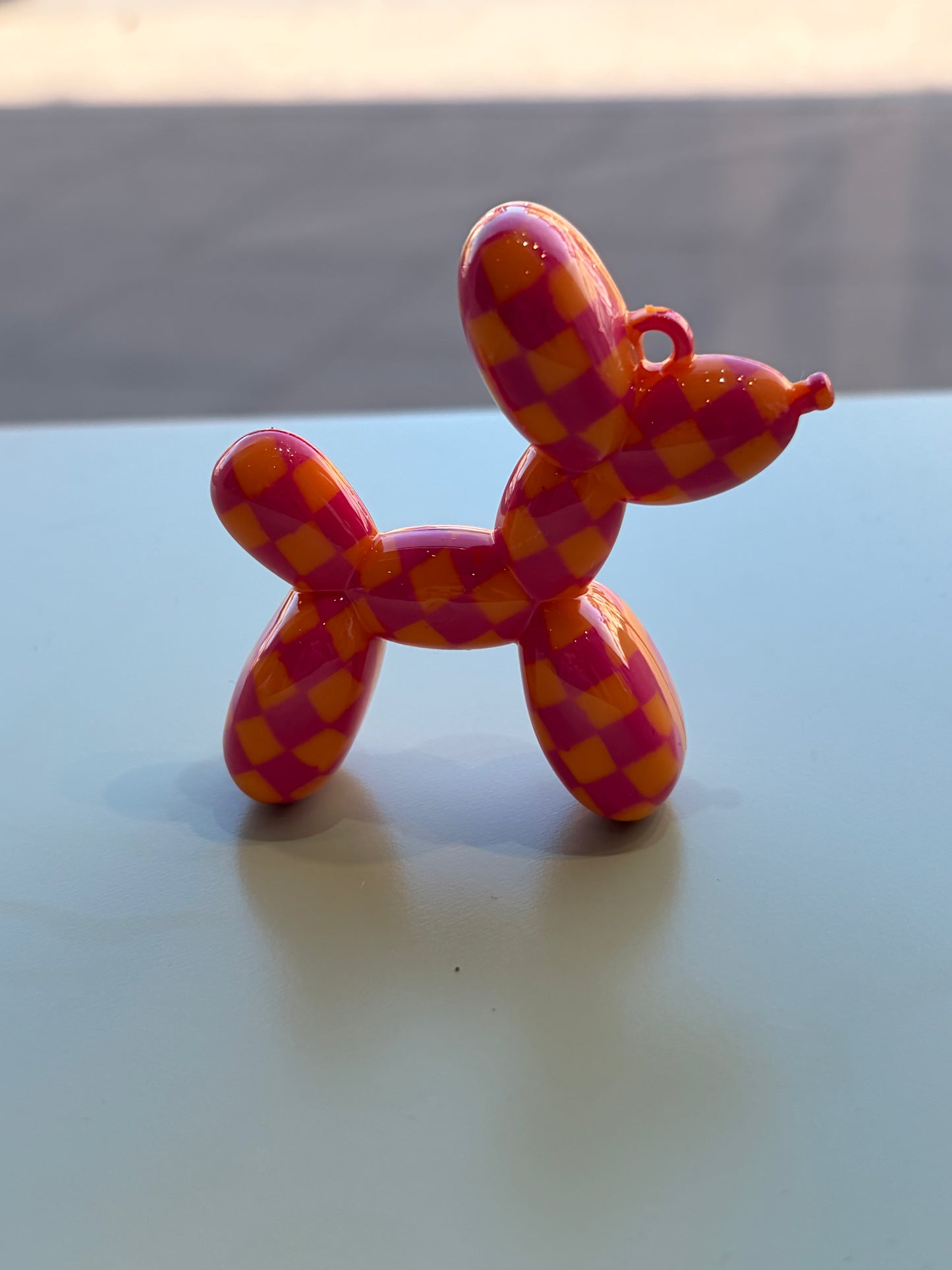 Checkered print balloon dog pendant