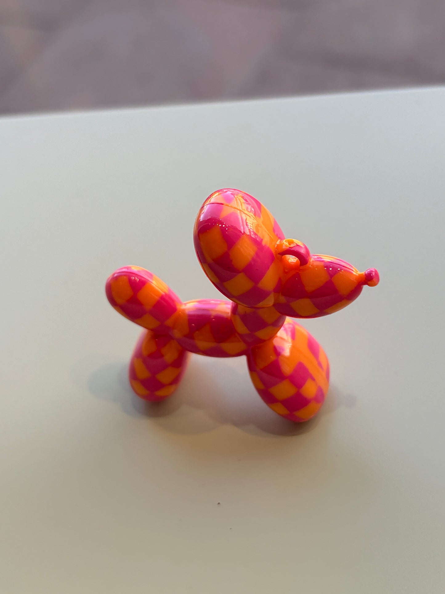 Checkered print balloon dog pendant